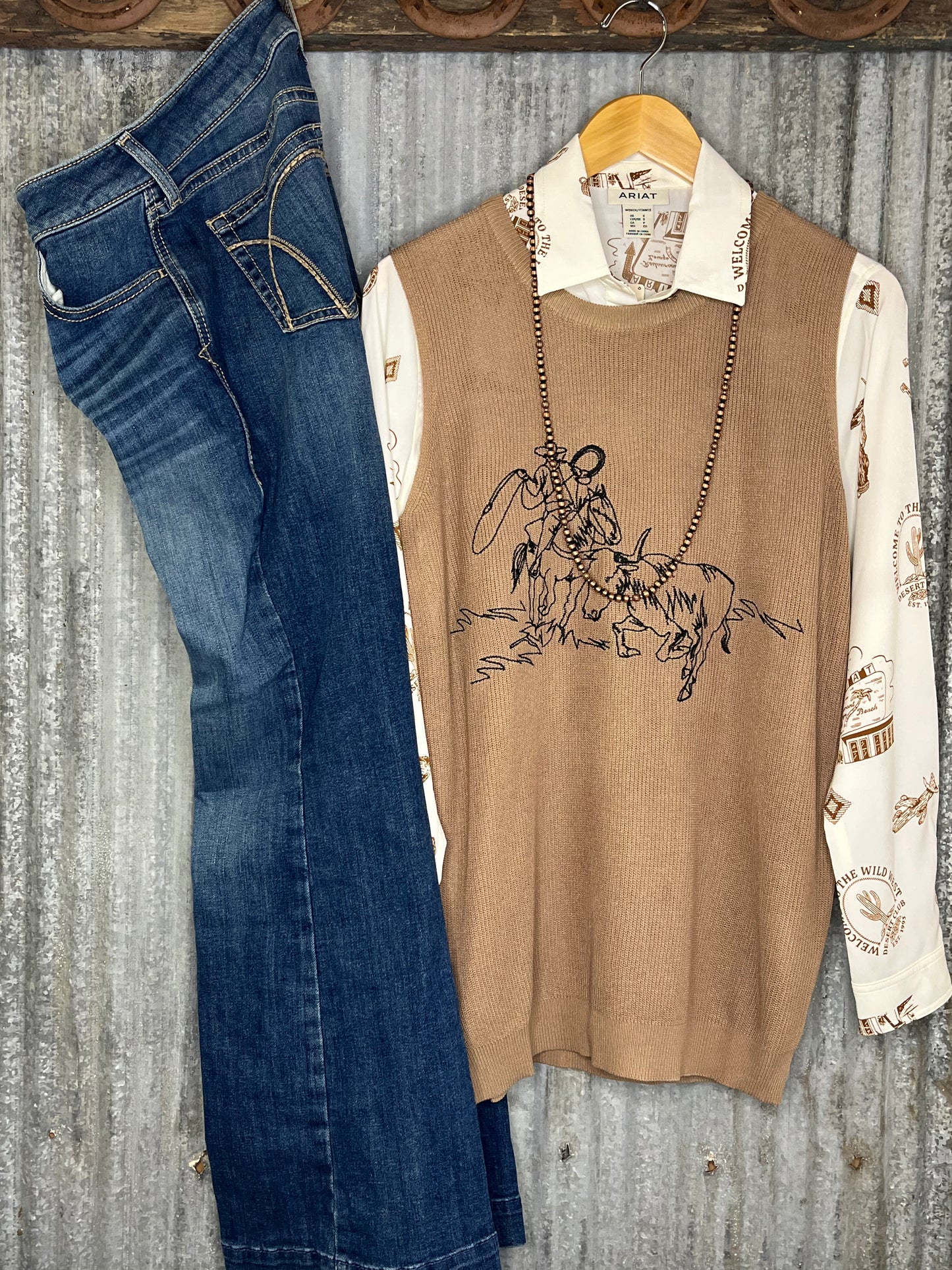 THE STAMPEDE SWEATER VEST