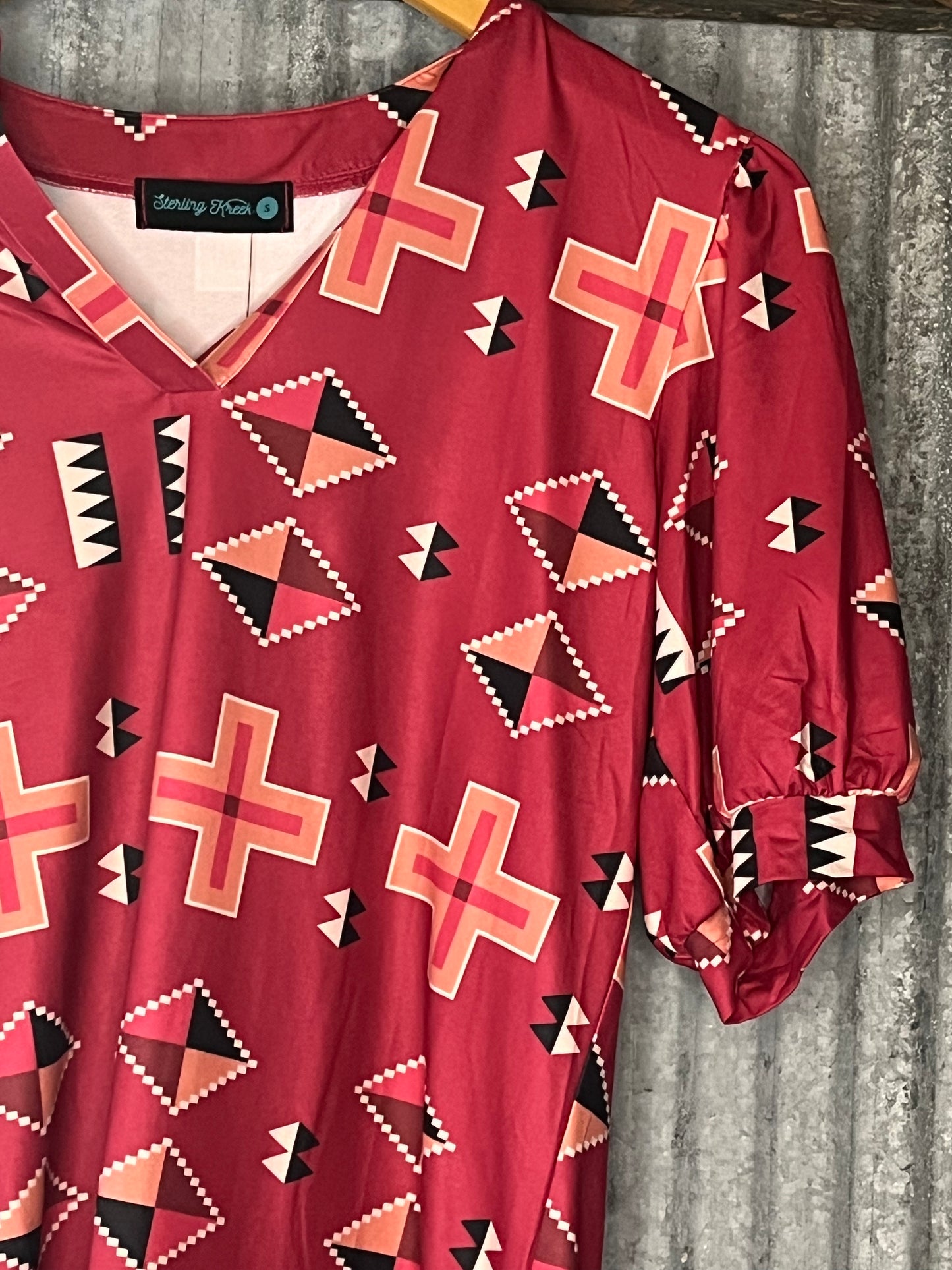 THE SUNSET TOP